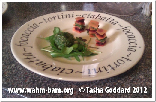 Vegan Seasonal Easter Starter: Carrot tower with beetroot puree and spring green and mint pesto layers, served with watercress and rocket garnish and spring green and mint pesto balls