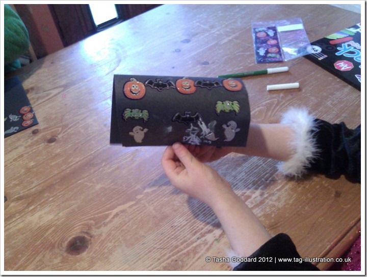 Making Halloween cards with stickers sent by Warner Bros.